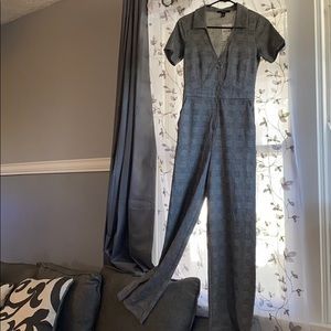 Jump suit black, white, grey.